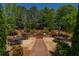 Wonderful outdoor patio area with a grilling station and tables for outdoor dining at 2300 Peachford Rd # 3411, Dunwoody, GA 30338