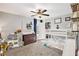 Bright bedroom features a bunk bed with slide, play kitchen and open closet at 569 Lovell Rd, Temple, GA 30179