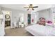 Comfortable bedroom with carpet, white furniture, and closet for storage at 569 Lovell Rd, Temple, GA 30179