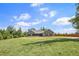 Scenic view of a single-story home with a spacious front yard, perfect for outdoor activities and Gathering gatherings at 569 Lovell Rd, Temple, GA 30179