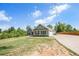 Inviting home with charming curb appeal, beautiful stone accents and an attached two car garage at 569 Lovell Rd, Temple, GA 30179