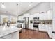 Kitchen with granite countertops and stainless steel appliances at 569 Lovell Rd, Temple, GA 30179