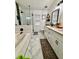 Modern bathroom with subway tile shower, a soaking tub, and double sink vanity at 7113 Silver Mine Xing, Austell, GA 30168