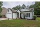 Inviting single-story home with manicured lawn and charming curb appeal at 7113 Silver Mine Xing, Austell, GA 30168