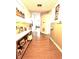Hallway with hardwood floors and wainscotting, leading into living spaces at 7113 Silver Mine Xing, Austell, GA 30168