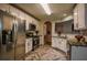 A gorgeous kitchen featuring herringbone tile, stainless steel appliances, and granite countertops at 7113 Silver Mine Xing, Austell, GA 30168
