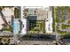 Aerial view showcasing a rooftop pool, garden, and the surrounding urban landscape at 285 Centennial Olympic Park Nw Dr # Ph2-7, Atlanta, GA 30313