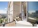 Private balcony with a cozy seating area and a view of the city at 285 Centennial Olympic Park Nw Dr # Ph2-7, Atlanta, GA 30313