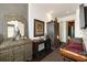 A modern suite featuring a bed, sitting bench, and chest at 285 Centennial Olympic Park Nw Dr # Ph2-7, Atlanta, GA 30313