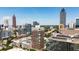 Stunning city view showcasing modern architecture and iconic skyscrapers against a clear blue sky, highlighting the urban skyline at 285 Centennial Olympic Park Nw Dr # Ph2-7, Atlanta, GA 30313