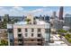 Beautiful building with a rooftop pool and city skyline view, providing a luxurious urban living experience at 285 Centennial Olympic Park Nw Dr # Ph2-7, Atlanta, GA 30313
