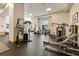 Well-equipped gym with modern exercise machines and ample space, promoting a healthy and active lifestyle at 285 Centennial Olympic Park Nw Dr # Ph2-7, Atlanta, GA 30313