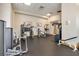 On-site gym with multiple weight machines and free weights at 285 Centennial Olympic Park Nw Dr # Ph2-7, Atlanta, GA 30313