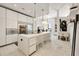 Modern kitchen with stainless steel appliances, a large island, and ample cabinet space at 285 Centennial Olympic Park Nw Dr # Ph2-7, Atlanta, GA 30313