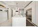 Bright modern kitchen with stainless steel appliances, an island, and a breakfast bar at 285 Centennial Olympic Park Nw Dr # Ph2-7, Atlanta, GA 30313