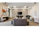 Elegant lounge area featuring a piano, modern art, and comfortable seating, creating a sophisticated atmosphere at 285 Centennial Olympic Park Nw Dr # Ph2-7, Atlanta, GA 30313