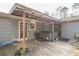 Exterior view of backyard with a hot tub on a wooden deck, offering relaxation and entertainment at 315 Charlotte Blvd, Stockbridge, GA 30281