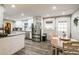 Modern kitchen featuring stainless steel appliances, ample cabinet space, and an adjacent dining area at 315 Charlotte Blvd, Stockbridge, GA 30281