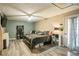 Spacious main bedroom with a ceiling fan, ample natural light, and wood-look floors at 315 Charlotte Blvd, Stockbridge, GA 30281