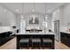 Modern kitchen with a large island, stainless steel appliances and barstool seating at 574 Boulevard Ne Pl # 4, Atlanta, GA 30308