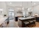 Contemporary kitchen with island seating and access to the outdoor balcony at 574 Boulevard Ne Pl # 4, Atlanta, GA 30308
