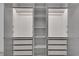 Spacious walk-in closet featuring shelving and rods at 574 Boulevard Ne Pl # 4, Atlanta, GA 30308