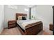Bedroom featuring hardwood furniture and warm accents, creating a cozy atmosphere at 116 Birch Tree Way, Cumming, GA 30040