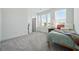 Bright bedroom with a large window and neutral decor at 116 Birch Tree Way, Cumming, GA 30040