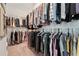 Walk-in closet with custom shelving providing ample storage space at 116 Birch Tree Way, Cumming, GA 30040