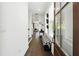 Inviting entryway with hardwood floors, white walls, and a stylish bench, creating a warm and welcoming atmosphere at 116 Birch Tree Way, Cumming, GA 30040