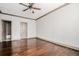 Elegant bedroom with hardwood flooring, recessed lighting, and ensuite bathroom at 1435 Druid Manor, Atlanta, GA 30329