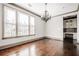 Bright dining area with large windows and a decorative chandelier for elegant dining at 1435 Druid Manor, Atlanta, GA 30329