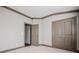 Cozy bedroom boasting neutral carpet, a double door closet, and light-colored walls at 1435 Druid Manor, Atlanta, GA 30329