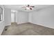 Light bedroom with carpet and view into the hallway at 361 Gordon Valley Sw Ln, Mableton, GA 30126