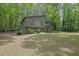 Inviting front view of the property with well-maintained landscaping and a sense of privacy at 361 Gordon Valley Sw Ln, Mableton, GA 30126