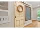 Entryway with custom storage and vintage door at 3870 Windhurst Dr, Lilburn, GA 30047