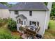 Aerial view of a backyard with a multi-level deck and patio with lush landscaping at 3924 Lorien Nw Way, Kennesaw, GA 30152