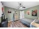 Bedroom with a bed, wood-look floors, and anime-themed décor at 3924 Lorien Nw Way, Kennesaw, GA 30152