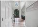 Welcoming foyer with tall ceilings, chandelier, and beautiful dark wood door, perfect for making a grand entrance at 3924 Lorien Nw Way, Kennesaw, GA 30152