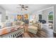 Spacious living room featuring an open layout connecting the living area and the modern kitchen, promoting social interaction at 3924 Lorien Nw Way, Kennesaw, GA 30152