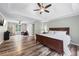 This main bedroom suite features hardwood floors, a trey ceiling, and sitting area at 3924 Lorien Nw Way, Kennesaw, GA 30152
