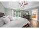 This main bedroom suite features a trey ceiling, wood floors, and lots of natural light at 3924 Lorien Nw Way, Kennesaw, GA 30152