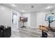 Finished basement office area with luxury vinyl floors, two closets and an office window at 3924 Lorien Nw Way, Kennesaw, GA 30152