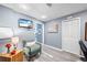 Relaxing office area featuring a TV, chair and luxury vinyl floors at 3924 Lorien Nw Way, Kennesaw, GA 30152