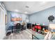 Finished basement features a modern office setup with luxury vinyl floors at 3924 Lorien Nw Way, Kennesaw, GA 30152