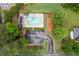 Aerial view of community pool and playground with mature trees and lush lawns at 3924 Lorien Nw Way, Kennesaw, GA 30152