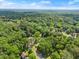 The verdant neighborhood is showcased in this stunning aerial view of the property at 1301 Eastridge Sw Rd, Atlanta, GA 30311