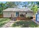 Charming backyard with a wooden deck, blue double doors, and a grill at 1301 Eastridge Sw Rd, Atlanta, GA 30311