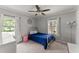 Bedroom with carpet, ceiling fan, and two windows at 1301 Eastridge Sw Rd, Atlanta, GA 30311