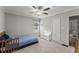 Bedroom with carpet, ceiling fan, and neutral color scheme at 1301 Eastridge Sw Rd, Atlanta, GA 30311